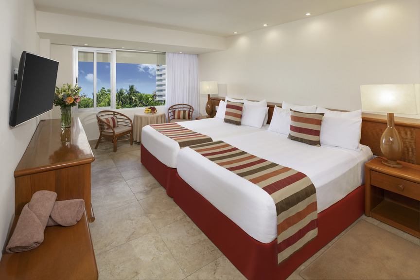 Habitación en Hotel Oasis Palm